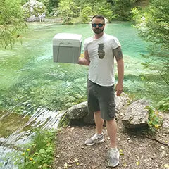 Man holding a TROBOLO toilet