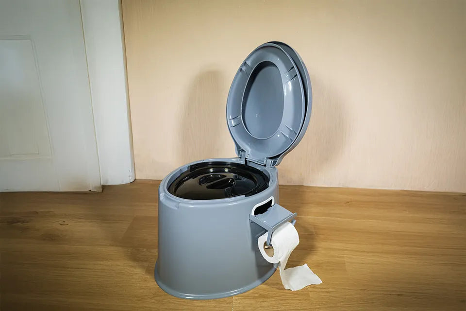 Dry toilet standing in room