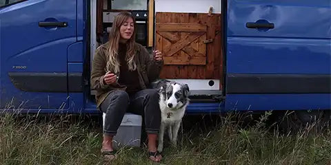 Woman with dog an dry toilet