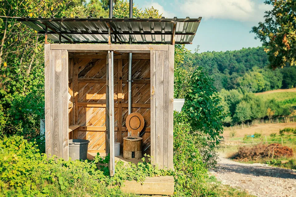 Wooden composting toilet in a garden shed